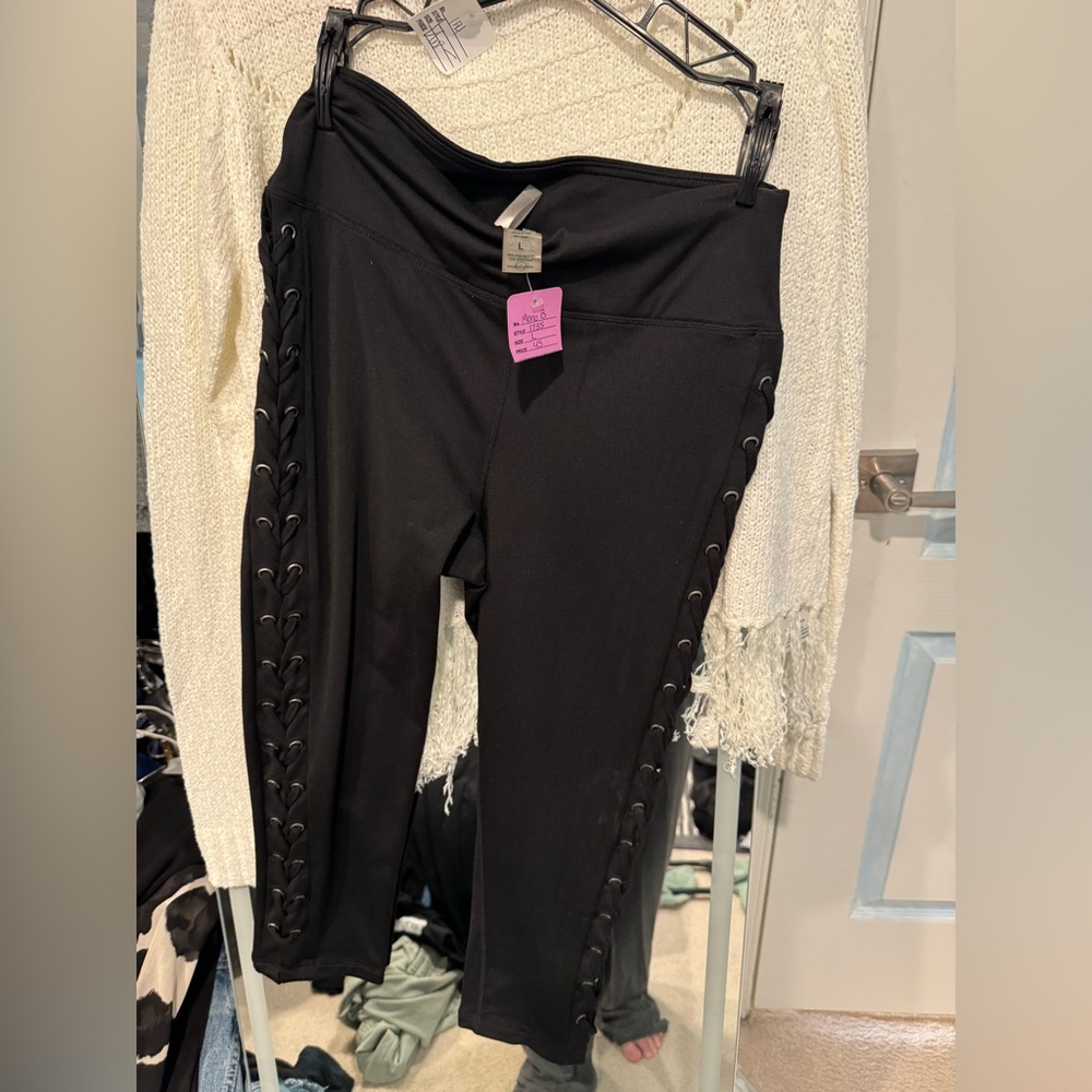 Black Mono B Cropped Leggings, with braided eye-lace on side (size large)